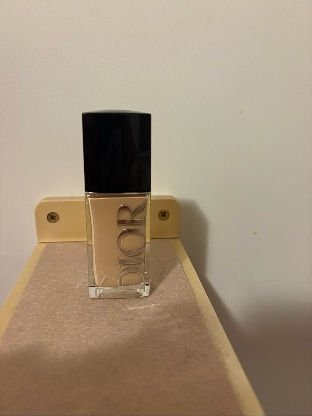 Dior Foundation Bottle in Beige with Black Cap
